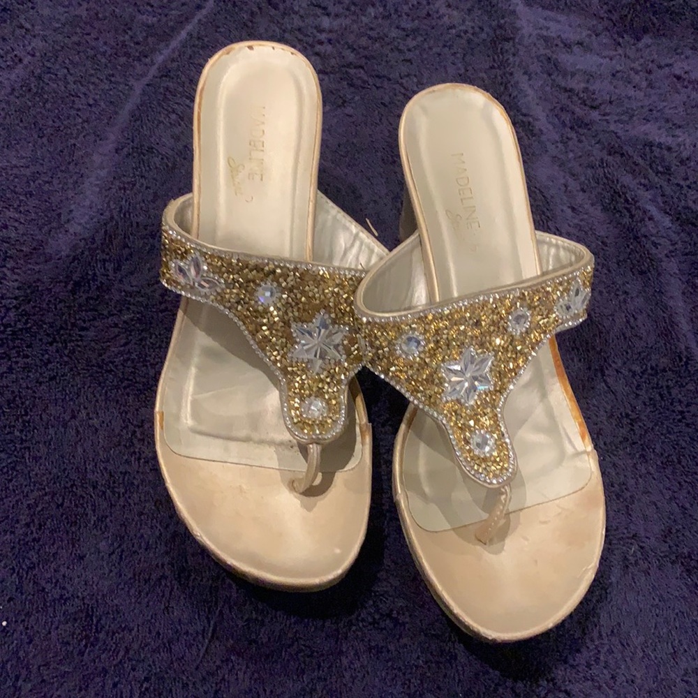 Madeline Stuart flip flop wedges.